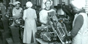 Workers operating the Hershey Kiss wrapping machines