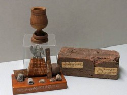 An Assemblage of relics from Gettysburg, 1863; a goblet made of wood from the famous peach orchard, 1896; and a brick from Appomattox, 1865