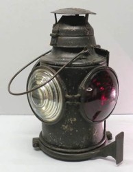 Signal Lantern, 1915-1925. This kerosene lantern was used by the Hershey Transit Company. It affixed to a trolley and was used to mark whether the streetcar was going, slowing down, or stopping.